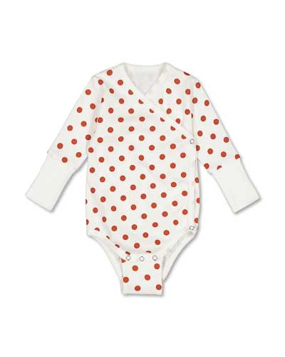 White wrap-around bodysuit with long sleeves, pattern with red dots.