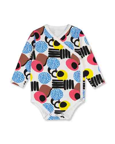 Wrap-around bodysuit with white ground colour, long sleeves, pattern called ‘Karkki’ (candy).